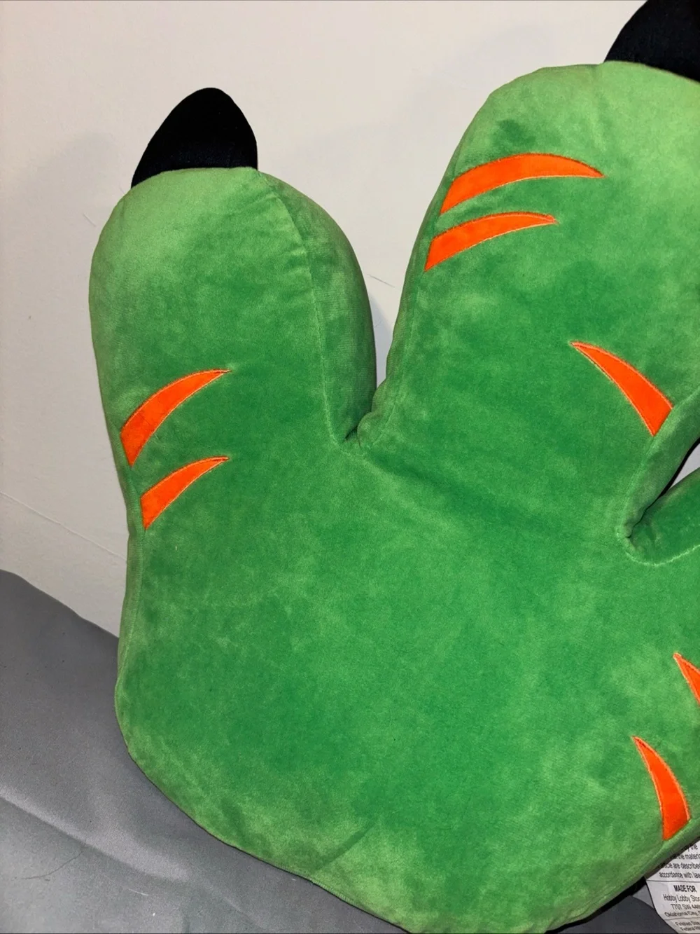 Hobby lobby green dinosaur foot throw pillow